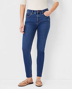 Sculpting Pocket Mid Rise Skinny Jeans in Mid Stone Wash