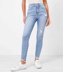 The Petite Chewed Hem High Waist Skinny Jean in Pure Light Indigo Wash