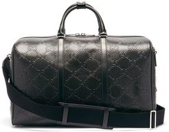 GG-monogram Perforated-leather Holdall - Mens - Black