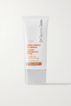 Instant Radiance Sun Defense Spf40 - Light/medium, 50ml