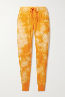 Lace-up Tie-dyed Organic Cotton-blend Jersey Track Pants - Saffron