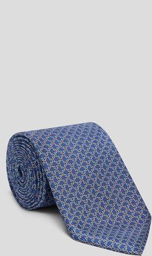 cravatta in pura seta stampata con motivo geometrico