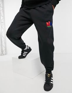 3D trefoil sweatpants in black
