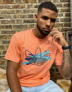 t-shirt with painted trefoil in orange