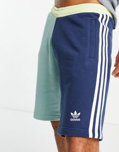 three stripe shorts in blocked green