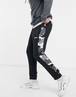Adidas sweatpants with camo side panel in black-Green