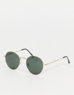 round sunglasses in gold