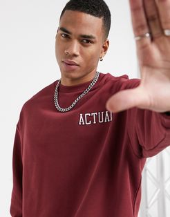 oversized sweatshirt in burgundy with embroidered logos