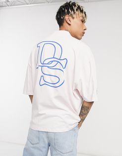 ASOS Daysocial oversized t-shirt with multi logo print detail in pink