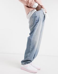 baggy jeans in tinted light wash blue