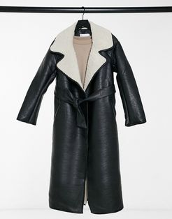 belted longline leather-look coat in black and cream