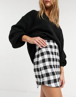 boucle mini skirt with curved hem in mono check print-Multi