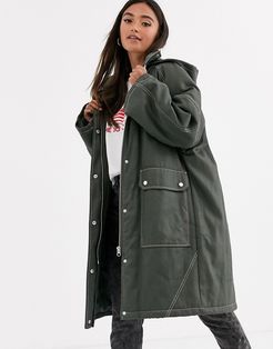 coated parka with contrast stitch detail in khaki-Green