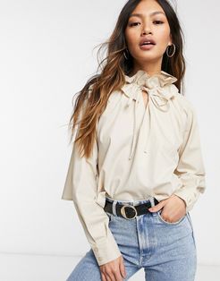 cotton ruffle neck detail top with tie front detail in stone