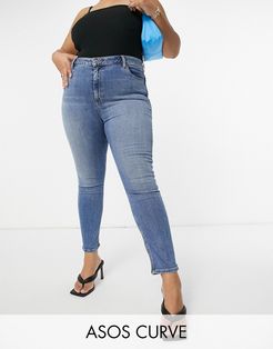 ASOS DESIGN Curve hourglass 'lift and contour' skinny jeans in midwash-Blue