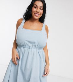 ASOS DESIGN Curve soft denim scoop neck skater dress in lightwash blue