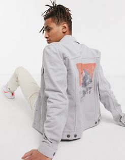 denim jacket in gray with back print