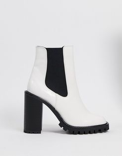 Expect high heeled chunky chelsea boots in white