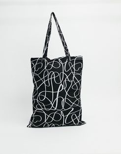 heavyweight tote bag in black with abstract print