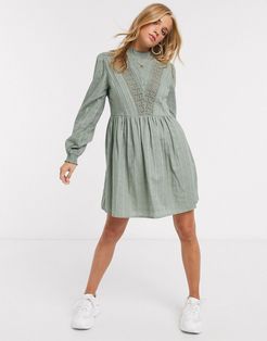 high neck mini smock dress with lace inserts in khaki-Green