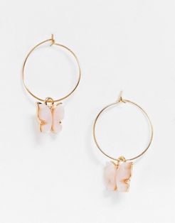 hoop earrings with pink butterfly charm in gold tone