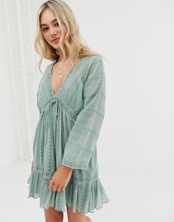 lace insert mini smock dress with lace up detail-Green