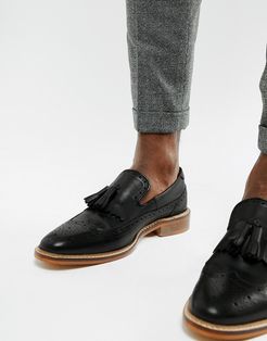 loafers in black leather with natural sole and fringe detail