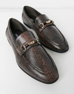 loafers in brown faux leather with snake effect and snaffle detail