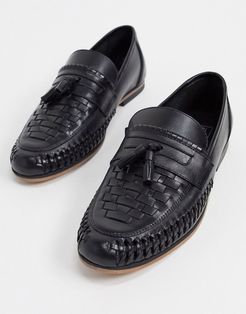 loafers in woven black leather with tassel detail