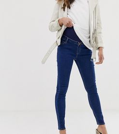 ASOS DESIGN Maternity high rise ridley 'skinny' jeans in rich mid blue wash with over the bump waistband-Blues