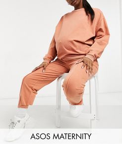 ASOS DESIGN Maternity tracksuit sweatshirt and pintuck front in acid wash in terracotta-Brown