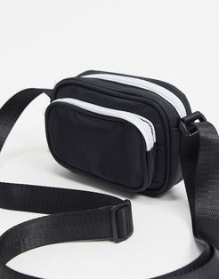 mini cross body camera bag in black with contrast zips