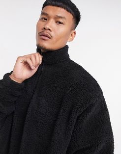 oversized half zip track neck sweatshirt in black teddy borg