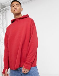 oversized hoodie with square pockets and thumb hole detail in bright red