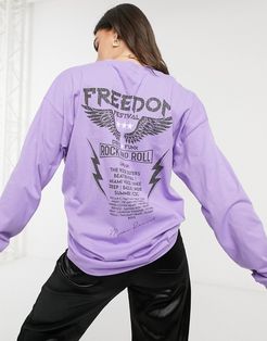 oversized t-shirt with long sleeve and rock graphic in purple