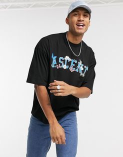 oversized t-shirt with text and floral chest print in black