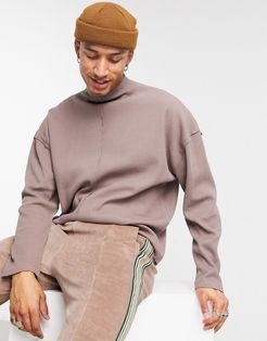 oversized waffle roll neck in brown-Pink