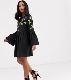 ASOS DESIGN Petite fluted sleeve embroidered smock mini dress-Black