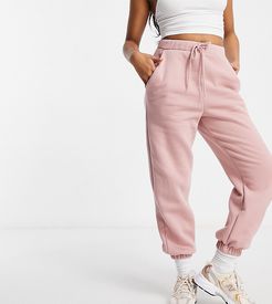 ASOS DESIGN Petite oversized sweatpants in dusty rose-Pink