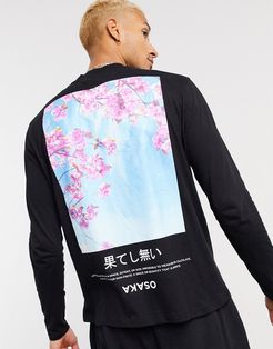 relaxed long sleeve t-shirt with art inspired back print in black organic cotton
