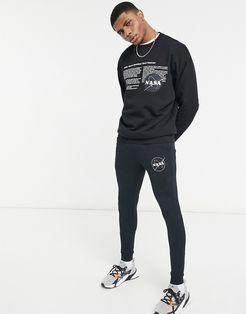 set super skinny sweatpants with Nasa print in black