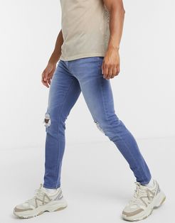 skinny jeans in light wash blue with knee rips-Blues