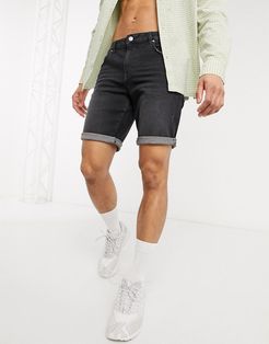 slim denim shorts in washed black with abrasions