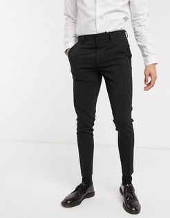 super skinny suit pants in four way stretch in black