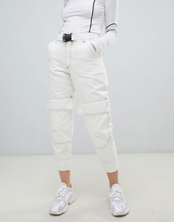 tapered jeans in winter white with utility styling and contrast stitch