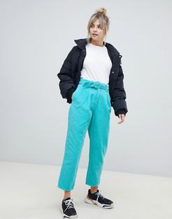 tapered jeans with curve seam in turquoise cord with self belt-Blues