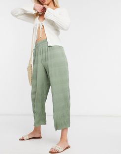 textured plisse culotte pants in pale khaki-Green