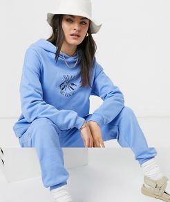 tracksuit oversized hoodie / oversized sweatpants with ski motif in blue-Beige