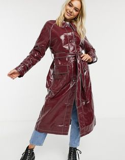 vinyl trench coat with contrast stitching in oxblood-Red