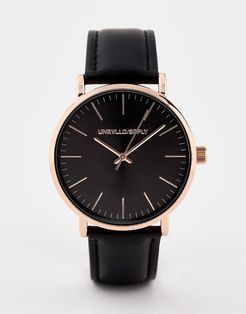 watch in black with rose gold case